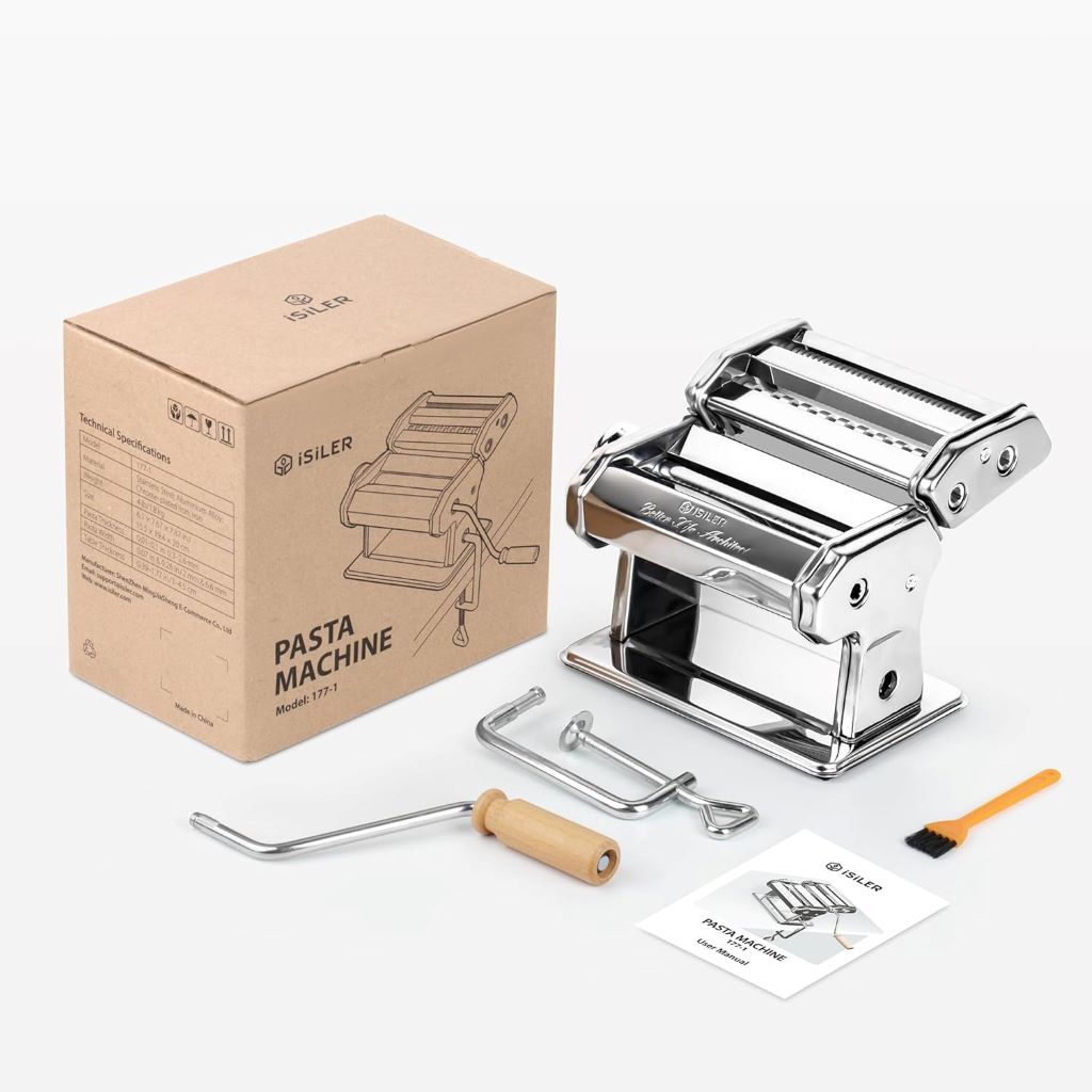 Close-up of ISILER pasta machine making fresh fettuccini and spaghetti at home.