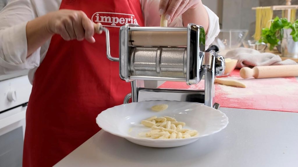 Heavy-duty steel Imperia gnocchi pasta cutter with wooden roller for fresh pasta making