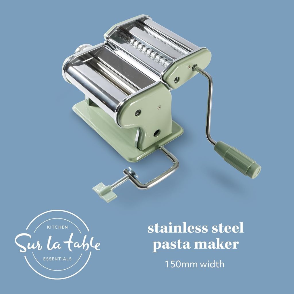 Sur La Table Va Bene Manual Pasta Maker – stainless steel hand-crank machine with adjustable rollers for fresh homemade pasta.