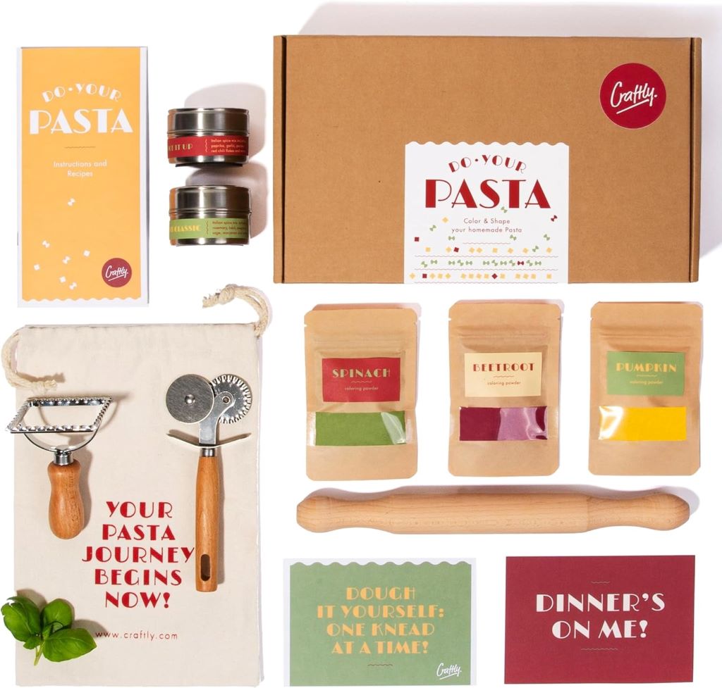 Craftly DIY Pasta Making Kit with rolling pin, cutting wheel, ravioli stamp, spices, and pasta dyes.