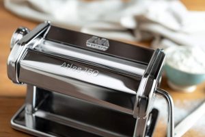 Homemade pasta made easy with Marcato Atlas 8340 pasta roller, includes instructions.