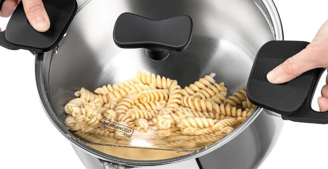 MICHELANGELO 6 Qt stainless steel pasta pot with strainer lid on stove