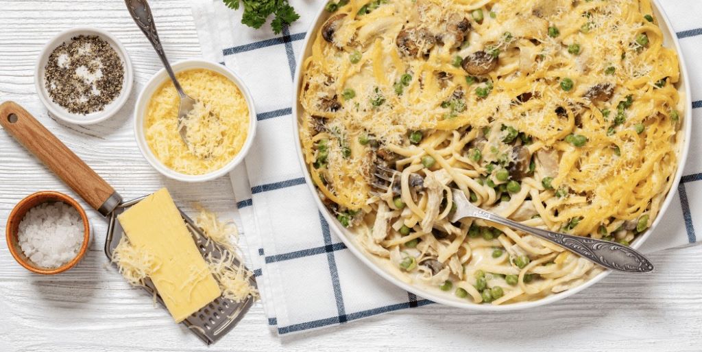 Close-up of diverse pasta plates from around the world, showcasing unique ingredients.
