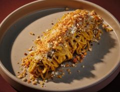 A colorful collage of popular international pasta dishes, including Italian spaghetti, Japanese ramen, and Thai pad see ew, symbolizing the global rise of pasta trends.