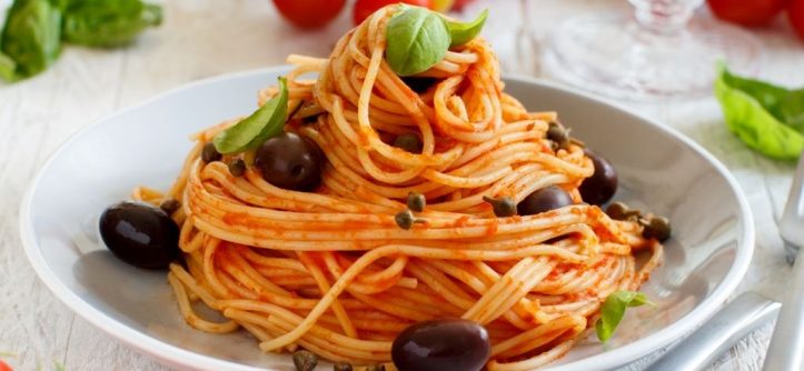 Variety of international fusion pasta dishes combining Italian and local flavors.