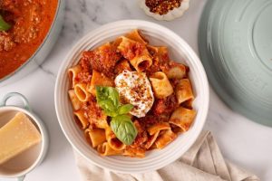 Elegant Le Creuset stoneware pasta bowls for serving