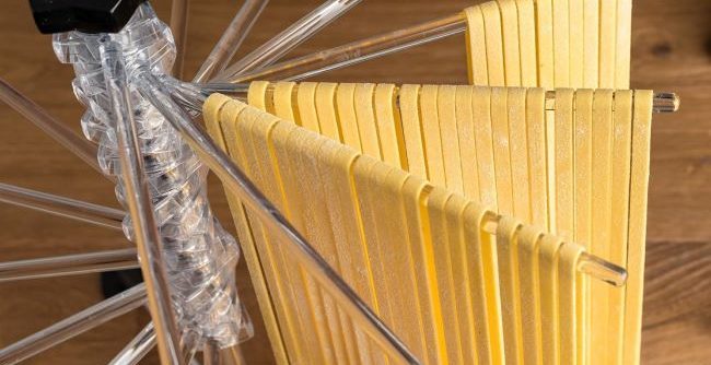 Easy-to-use MARCATO pasta drying rack in clear plastic design.