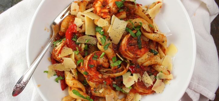 Close-up of Asian fusion pasta dish combining noodles with Asian flavors.