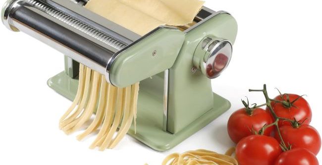 Sur La Table Va Bene Manual Pasta Maker with rollers and cutters on kitchen counter