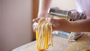 Home cooks worldwide addressing common pasta maker problems in their kitchens.
