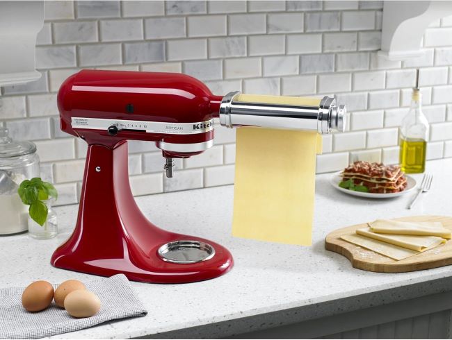 KitchenAid KSMPSA silver pasta roller attachment for stand mixer flattening fresh dough into pasta sheets