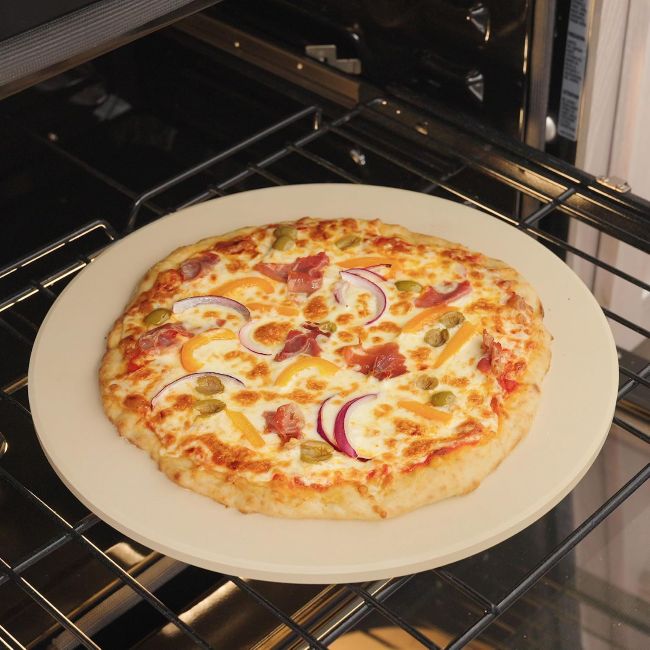 Old Stone Pizza Stone baking a crispy homemade pizza in a residential oven